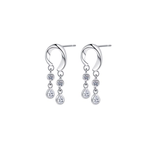 Close-up of S925 sterling silver drop earrings with white zircon tassel chain and claw setting