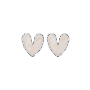 Detail of silver heart earrings featuring cream marble texture inlay and polished metal edges