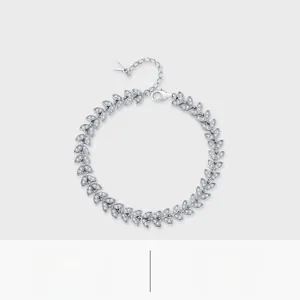 Close-up of S925 sterling silver wheat link bracelet with shimmering zircon stones