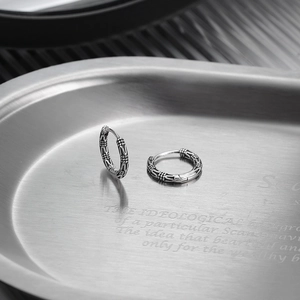 Vintage S925 sterling silver hoop earrings with intricate floral relief pattern for men and women
