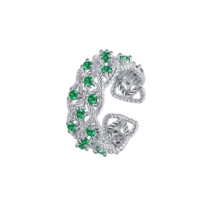 Detail of silver S925 ring featuring green zircon stones and vintage floral weaving texture