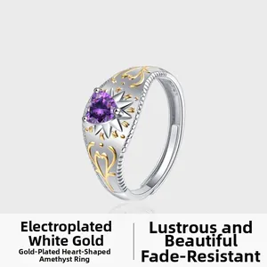 Close-up of S925 silver ring featuring purple heart gemstone and gold filigree details