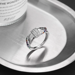 S925 sterling silver multilayer ring with colorful gemstones on a silver tray