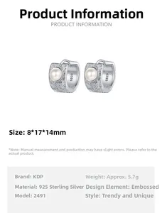 Detailed view of S925 silver pearl hoop earrings with vintage floral relief patterns