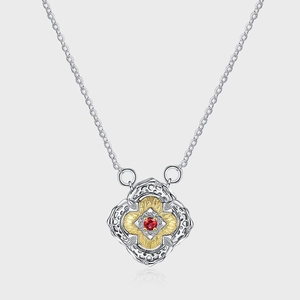 Elegant s925 silver petal necklace with gold accents and a central red zircon stone