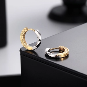 Elegant S925 silver Mobius hoop earrings with dual-tone gold plating and floral engraving