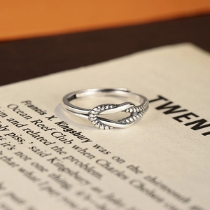 Adjustable S925 sterling silver knot ring with a minimalist twisted rope design