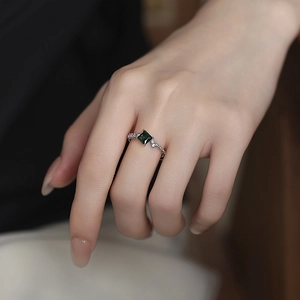 S925 silver ring with square emerald-cut green gemstone and micro-pave diamonds on band