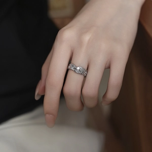 S925 sterling silver wing ring with sparkling diamond inlay and hollow feather texture