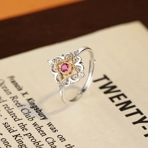 S925 silver vintage open ring with rose red stone and heart hollow design on book background