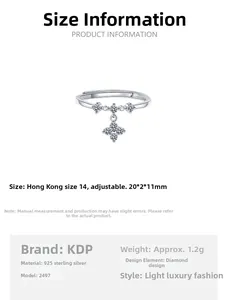 Detail of adjustable S925 silver ring featuring sparkling star charms and drop pendant