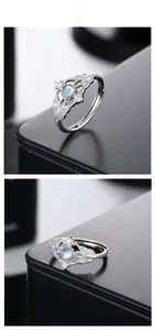 Detailed view of S925 silver ring featuring moonstone and hollow lace floral pattern