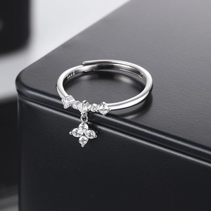 Elegant S925 sterling silver ring with a dangling cross star pendant and sparkling zircon stones