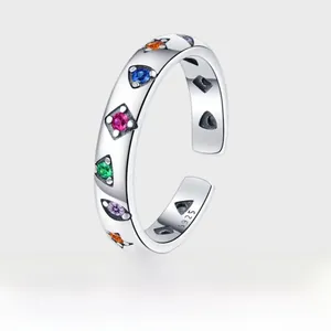 Macro shot of S925 sterling silver stamp on adjustable ring with colorful gemstones