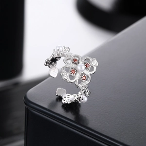S925 sterling silver open ring with hollow clover flower design and pearl accents