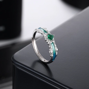 S925 silver ring with emerald-cut green gemstone and gradient enamel floral accents