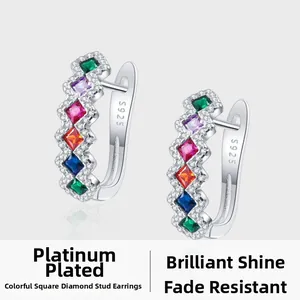 Close-up of S925 sterling silver earrings with colorful square zircons and micro-pave crystals