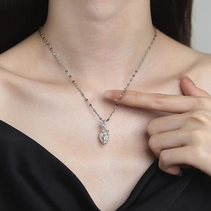 Elegant S925 silver leaf pendant necklace with a round pearl on a female neck model