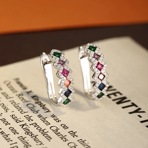 Elegant S925 sterling silver hoop earrings with colorful square gems on vintage paper
