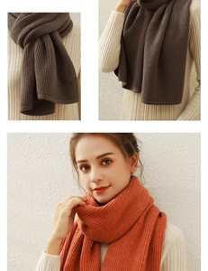 Detail of soft ribbed knit scarf in dark coffee and vibrant orange autumn colors