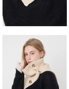 Detailed view of bicolor wool knit scarf with beige ribbed collar and amber buttons