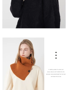 Detail of orange wool knit neck warmer with vertical stripes and black button closure