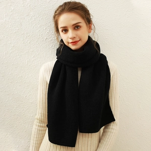 Classic black knitted scarf with vertical rib texture and thick thermal insulation