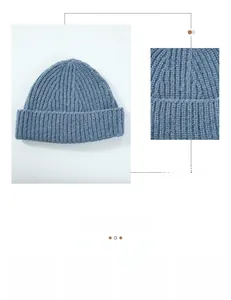 Macro detail of the gray-blue ribbed knit texture and thick wool blend fabric on beanie