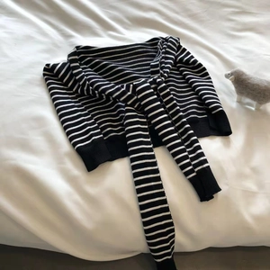 Classic black and white striped knit shawl with long ties for women stylish layering