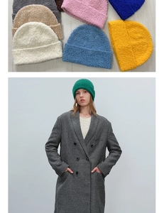 Close-up of textured chunky knit wool beanie in various colors with folded cuff detail