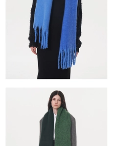 Detailed macro view of soft brushed knit scarf featuring stylish long tassels and vibrant colors