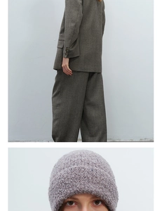 Close-up of lilac plush wool beanie featuring rich knitted texture and a cozy stylish fit