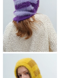 Detail of colorful striped faux fur Balaclava in purple and yellow plush knit material