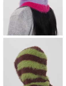 Close-up of striped faux mink balaclava hats in purple, pink, green and brown fur