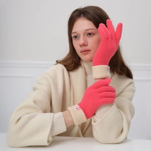 Women's pink wool knit winter gloves with stylish ribbed cuffs and thermal insulation
