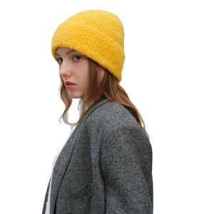 Bright yellow textured knit beanie hat for men and women with warm wool-blend yarn