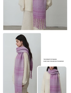 Detail of purple plaid bouclé scarf with long tassels and soft mohair texture