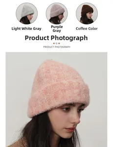 Detail view of various color options for women's chunky knit wool beanies with soft texture