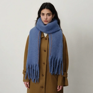 Blue oversized cashmere-like scarf with orange contrast stitching and long fringes