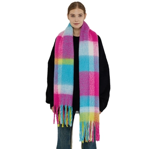 Thick plaid cashmere scarf with vibrant pink, blue, and yellow squares and long tassels