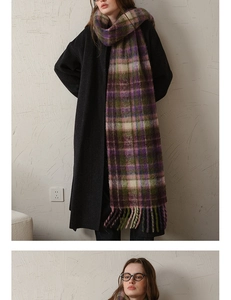 Detail of plaid mohair scarf featuring purple and green checks with thick tassels