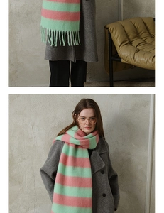 Detail of pink and mint green striped cashmere scarf with long tassel textures