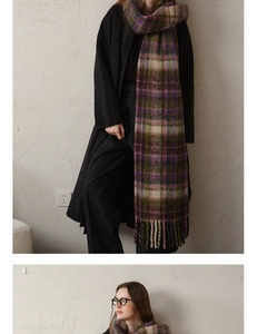 Detail of winter thick plaid scarf with purple and moss green patterns and long tassels