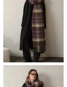 Detail of soft mohair plaid scarf in purple and green with long tassels for winter
