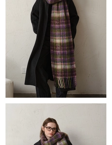 Detail of thick checkered mohair scarf featuring purple and green plaid with long tassels