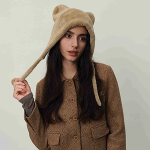Cozy camel faux fur winter hat with cute animal ears and ear flaps for warmth