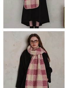 Close-up of pink and white plaid scarf featuring thick brushed texture and faux lamb wool edges