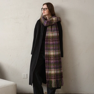 Thick checkered winter scarf with fringes in purple, green and beige patterns