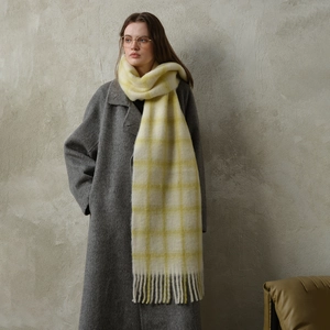 Soft checkered wool scarf in yellow and cream with tassels for winter fashion