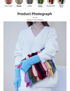 Detail showing various colors of wool blend knitted gloves with ribbed texture finish